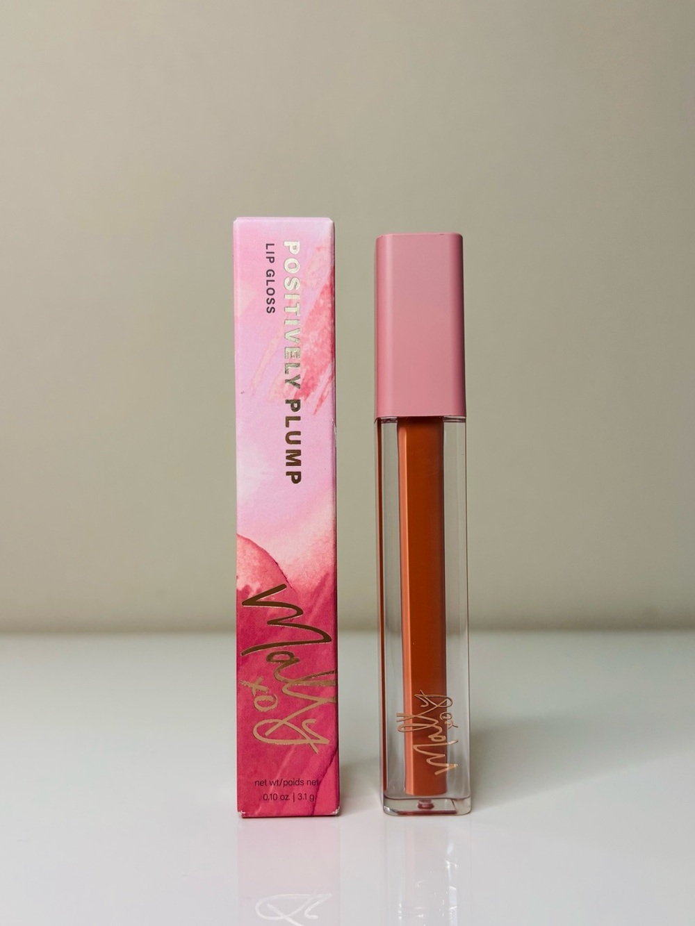 Mally Beauty XO Positively Plump Hydrating Lip Gloss in the shade Peach Parfait